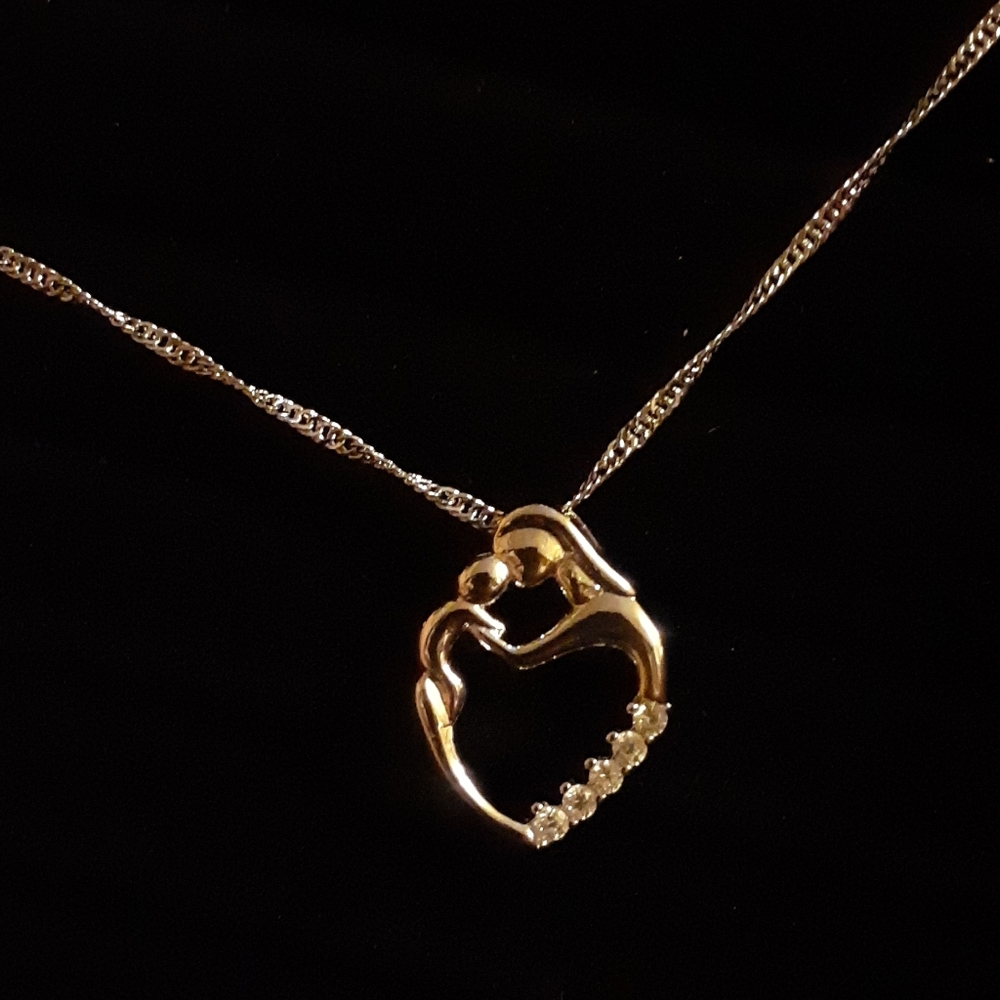Nwot 925 sterling silver mother and child pendant
